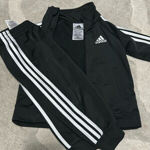 Gently used toddler Adidas track suit size 12 months
